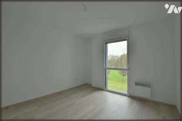 APPARTEMENT T3 AVEC ASCENSEUR GARAGE ET TERRASSE LE RHEU