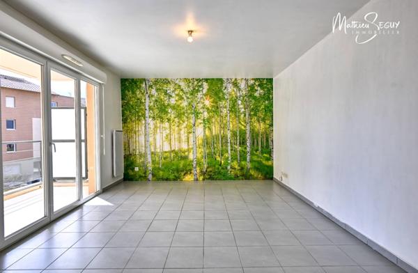 Craponne - Appartement T2 avec terrasse et place de stationnement extérieur