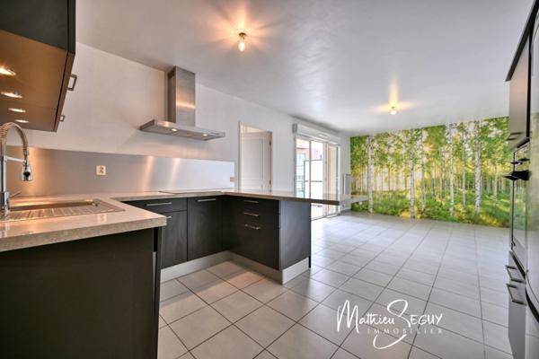 Craponne - Appartement T2 avec terrasse et place de stationnement extérieur