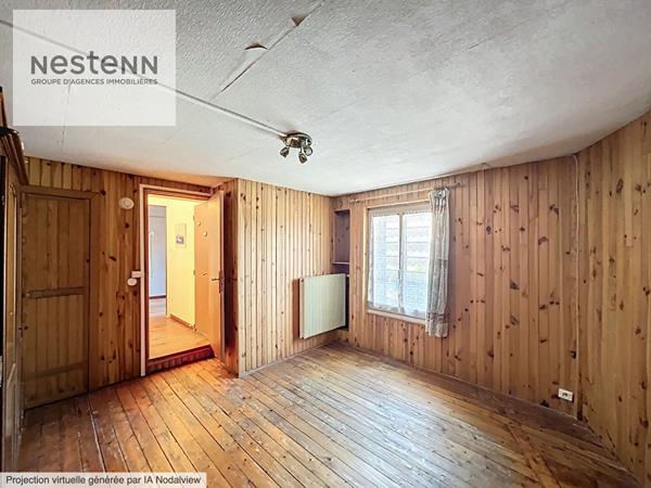 À Vendre Maison de ville au calme avec deux chambres un double garage d'environ 40 m² et potentiel d'agrandissement