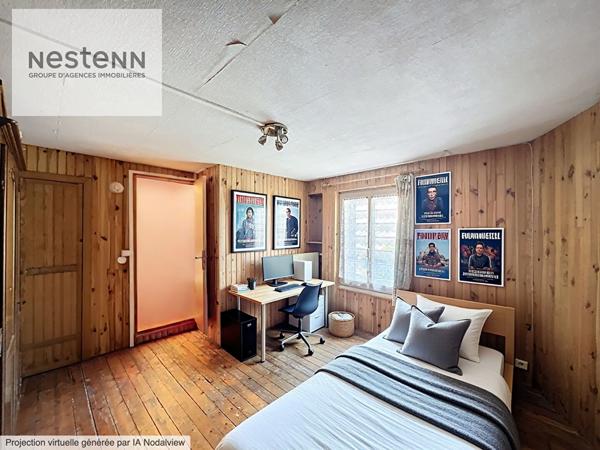 À Vendre Maison de ville au calme avec deux chambres un double garage d'environ 40 m² et potentiel d'agrandissement