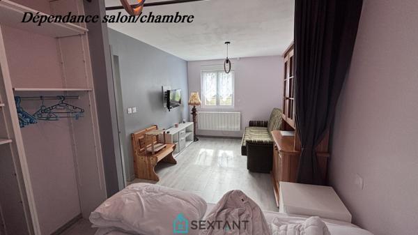 Pavillon familial de 140 m² avec dépendance aménagée, sous-sol complet et grand terrain de 1 000 m²