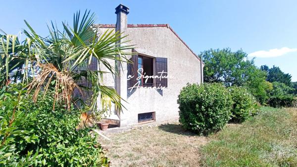 Maison Plain-pied sur sous-sol avec garage et jardin 7454 m2