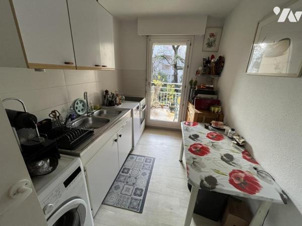 Appartement traversant avec terrasse et vue sur jardin- Nimes