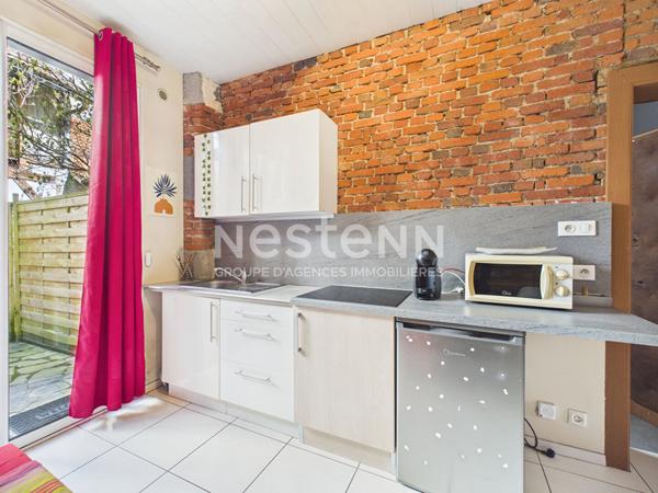 Aurillac, proche rue des Carmes, à Vendre Immeuble 4 appartements, avec garage et jardin.