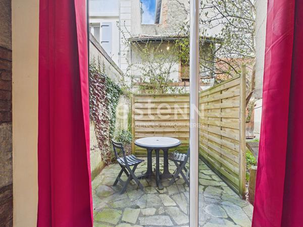 Aurillac, proche rue des Carmes, à Vendre Immeuble 4 appartements, avec garage et jardin.