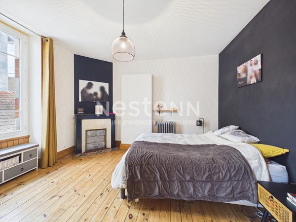 Aurillac, proche rue des Carmes, à Vendre Immeuble 4 appartements, avec garage et jardin.