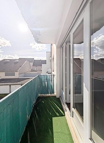 Appartement à DEUX MINUTES À PIED DE LA GARE avec balcon, cave et GARAGE.