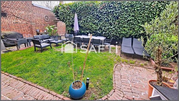 Maison de ville vivable de plain pied avec jardin