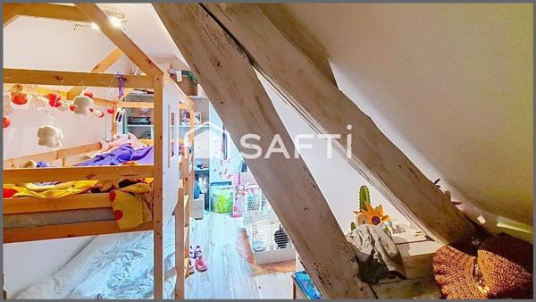 Maison de ville vivable de plain pied avec jardin