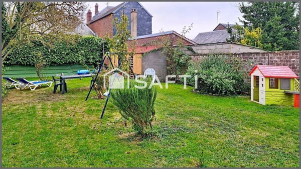 Maison de ville vivable de plain pied avec jardin