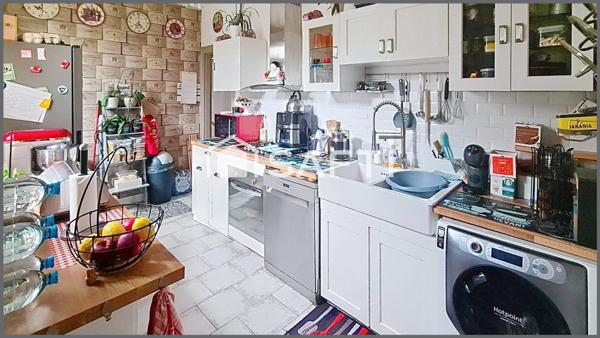 Maison de ville vivable de plain pied avec jardin