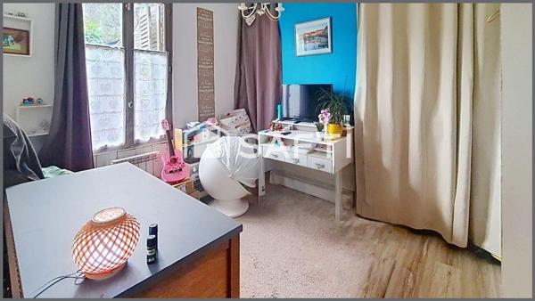 Maison de ville vivable de plain pied avec jardin