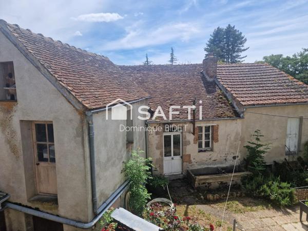 Maison double avec cour intérieure. 3 garages.