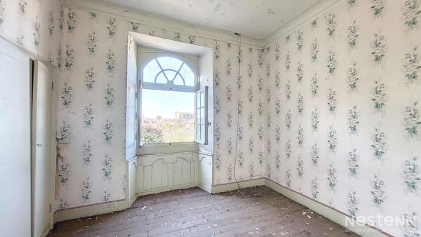 A Vendre Maison en pierre mitoyenne de 165 m² avec jardin proche du centre-ville