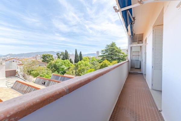 MARSEILLE 8ᵉ – RUE PARADIS | APPARTEMENT DE CARACTÈRE AVEC BALCONS, GARAGE EN OPTION