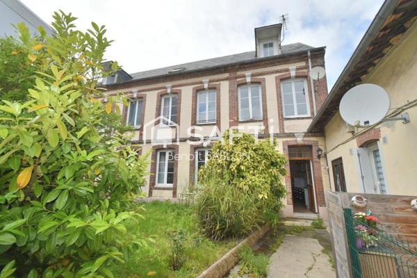 Maison 4 chambres, garage, cave, atelier et jardin