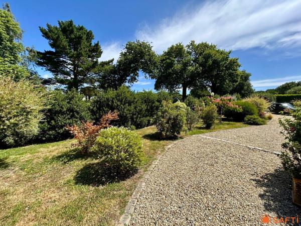 Villa aux volumes généreux  avec vue à 180 degrés sur le golf