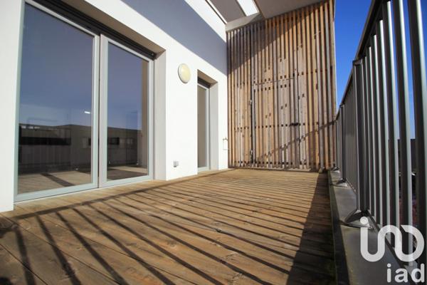 Appartement 4 pièces de 85 m² à Bezannes (51430)