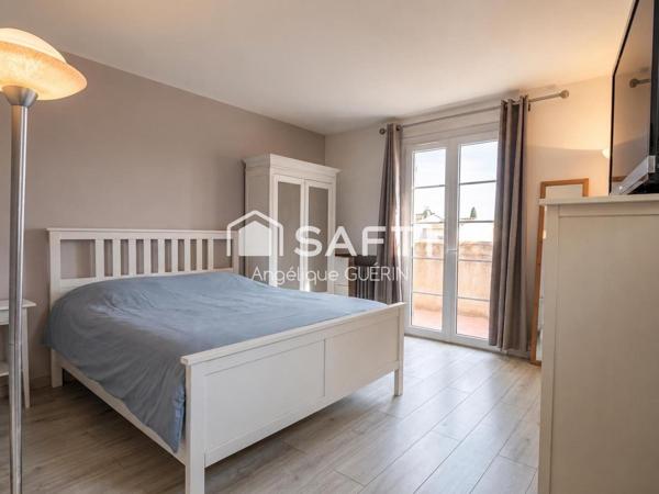 Maison individuelle avec jardin, double garage et potentiel d’agrandissement