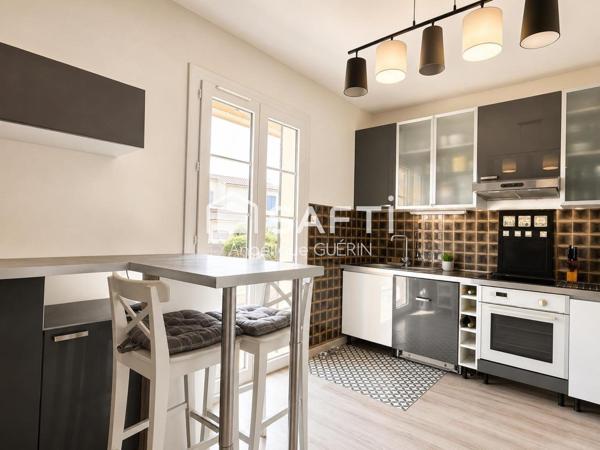 Maison individuelle avec jardin, double garage et potentiel d’agrandissement