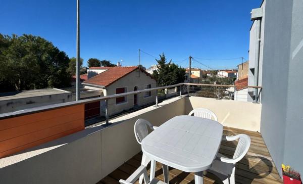 Appartement 3 pièces terrasse stationnement