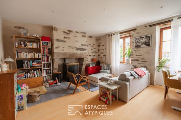 Esprit maison de ville : duplex rénové avec charme et terrasse bois