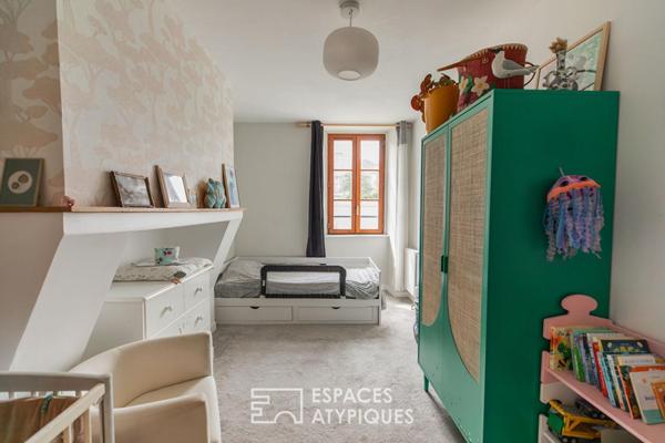 Esprit maison de ville : duplex rénové avec charme et terrasse bois