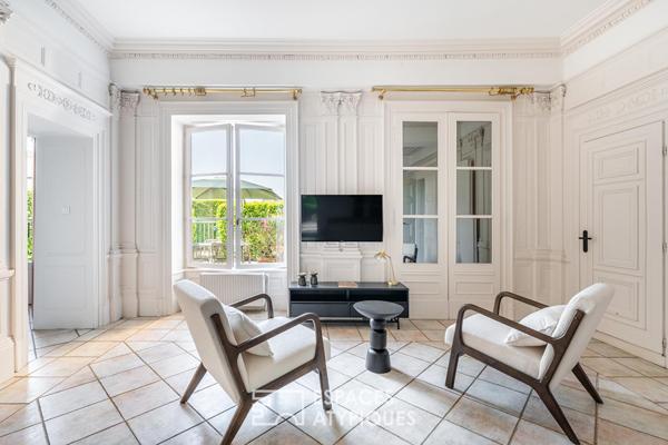 Location Meublée d’Exception : Appartement de Prestige en rez-de-jardin au coeur d’une bâtisse en Pierres Dorées