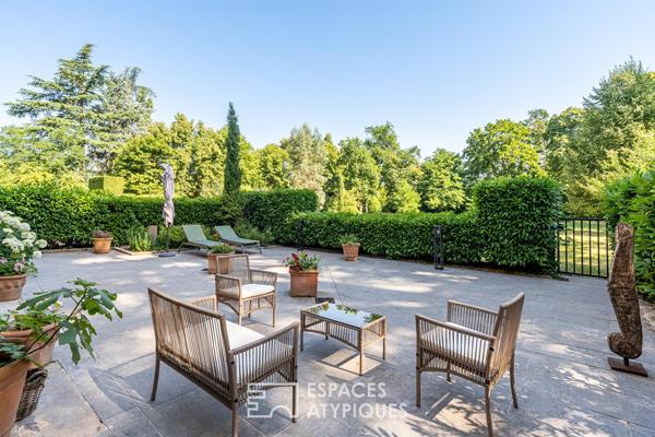 Location Meublée d’Exception : Appartement de Prestige en rez-de-jardin au coeur d’une bâtisse en Pierres Dorées