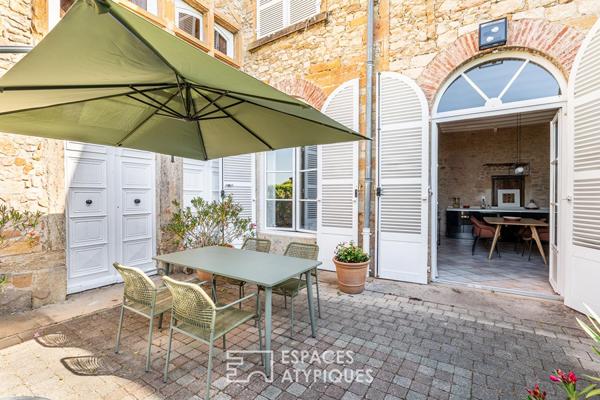 Location Meublée d’Exception : Appartement de Prestige en rez-de-jardin au coeur d’une bâtisse en Pierres Dorées