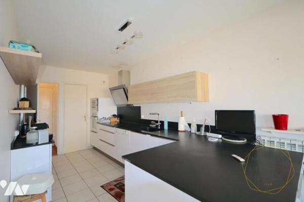 Appartement T5 avec 2 parkings et une cave