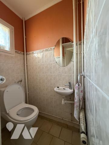 Maison semi avec garage et jardin