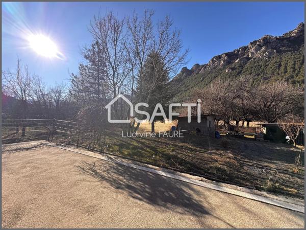 Maison 7 pièces avec terrain constructible