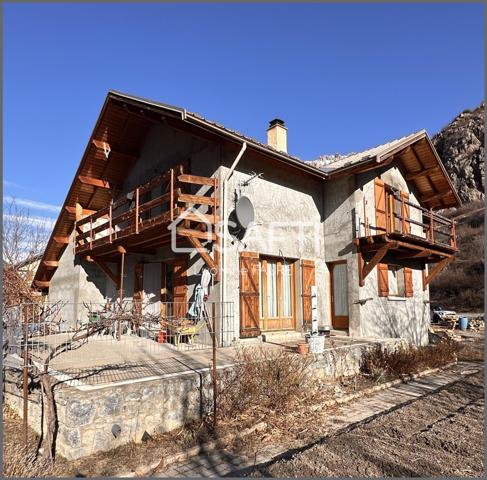 Maison 7 pièces avec terrain constructible