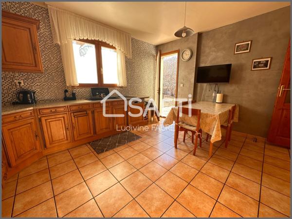 Maison 7 pièces avec terrain constructible