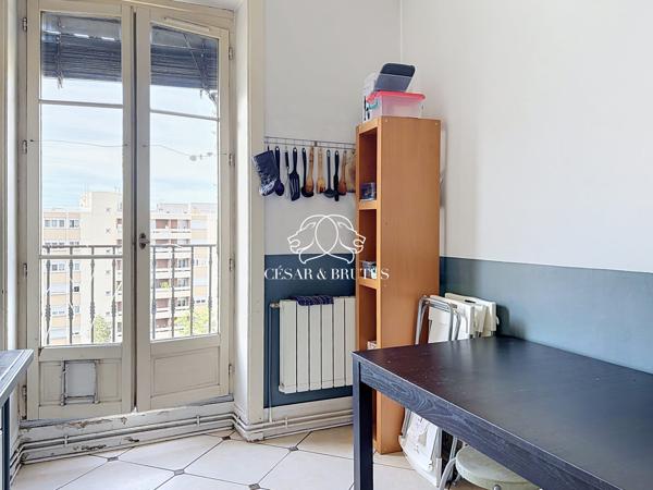 Lyon 7e — Rue Marc Bloch | Élégance haussmannienne au 4e étage avec ascenseur