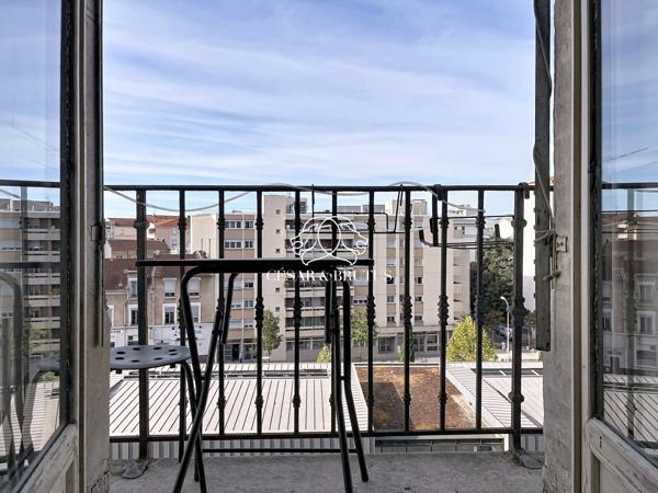 Lyon 7e — Rue Marc Bloch | Élégance haussmannienne au 4e étage avec ascenseur