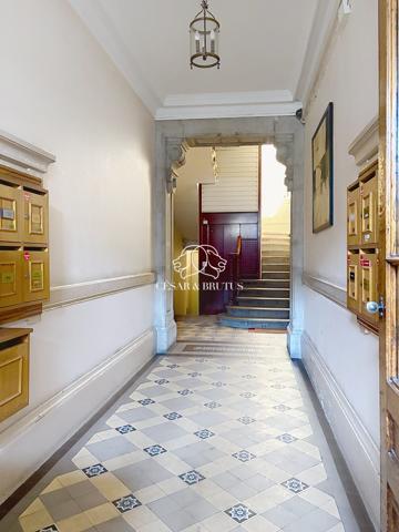 Lyon 7e — Rue Marc Bloch | Élégance haussmannienne au 4e étage avec ascenseur