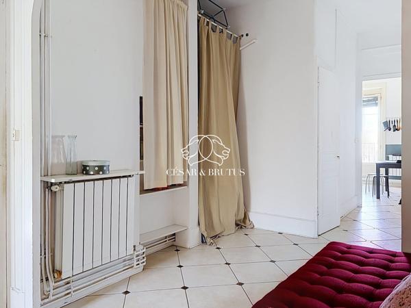 Lyon 7e — Rue Marc Bloch | Élégance haussmannienne au 4e étage avec ascenseur