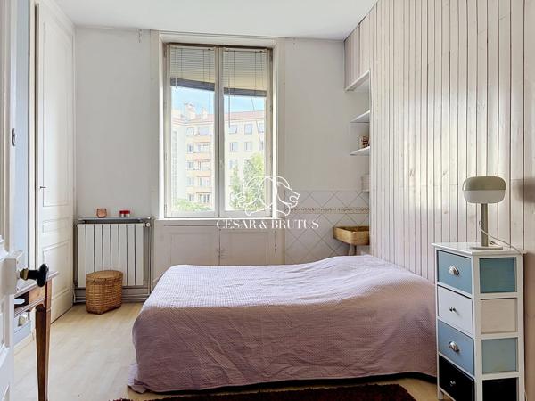 Lyon 7e — Rue Marc Bloch | Élégance haussmannienne au 4e étage avec ascenseur