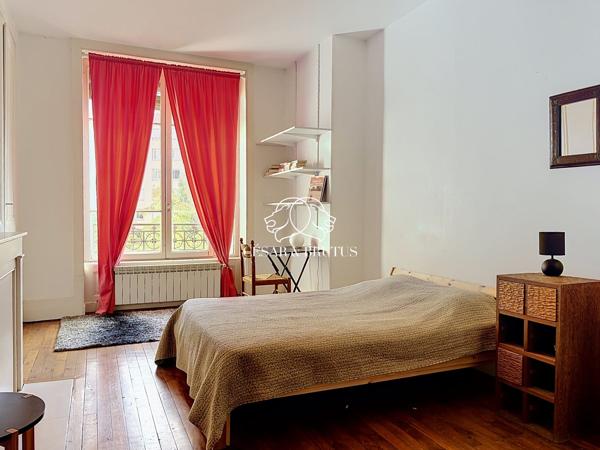 Lyon 7e — Rue Marc Bloch | Élégance haussmannienne au 4e étage avec ascenseur