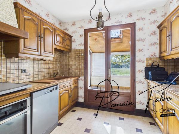 Maison au calme avec garage et belle situation