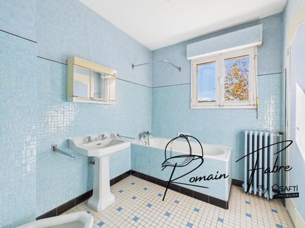 Maison au calme avec garage et belle situation