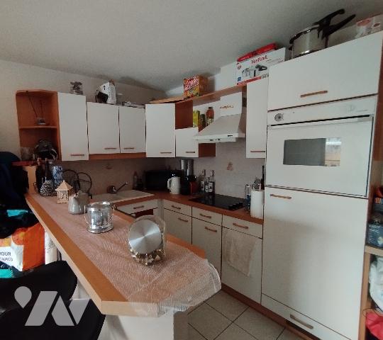 Appartement T2, garage, balcon, exposition sud