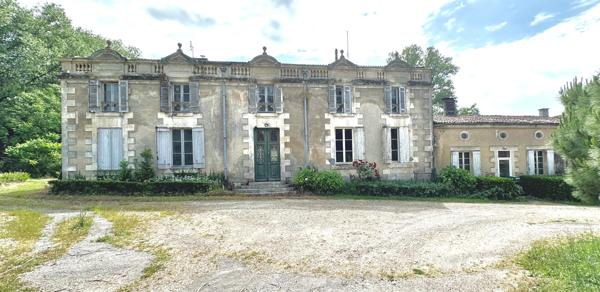 PROPRIÉTÉ DE 650 M2 HABITABLES TERRAIN 28 HECTARES