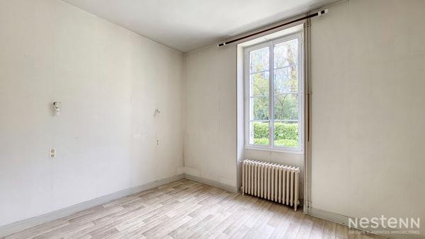 A Vendre Maison de 103 m² avec garages en sous-sol et jardin proche du chemin de Compostelle