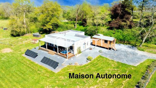 MAISON PASSIVE BOIS AVEC GRAND TERRAIN ET VUE DOMINANTE