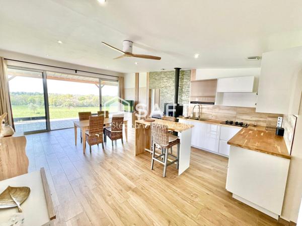 MAISON PASSIVE BOIS AVEC GRAND TERRAIN ET VUE DOMINANTE