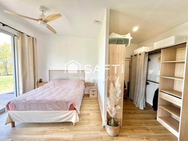 MAISON PASSIVE BOIS AVEC GRAND TERRAIN ET VUE DOMINANTE